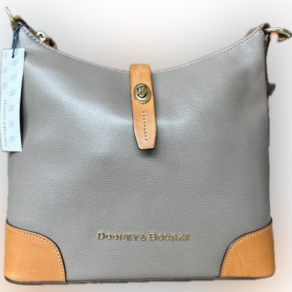 Dooney & Bourke Handbags - Dooney and Bourke Pebble Grain Crossbody Bucket bag. Taupe color. NEVER USED